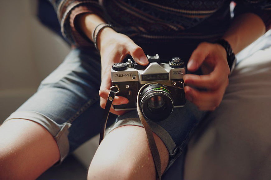 Person Holding Vintage Zenit Film Camera