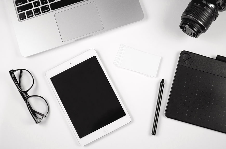 Minimalist Creative Workspace Flat Lay with Laptop and Tablet