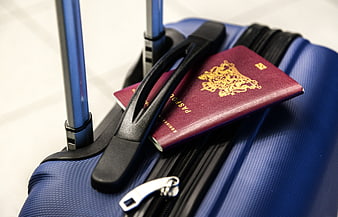 Passports on Blue Suitcase Ready for Travel