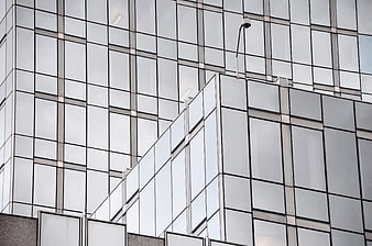 Modern Glass Building Facade With Geometric Grid Pattern