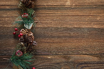 Christmas decorations on rustic wooden background with copy space