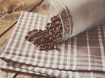 Spilled Coffee Beans on Checkered Cloth