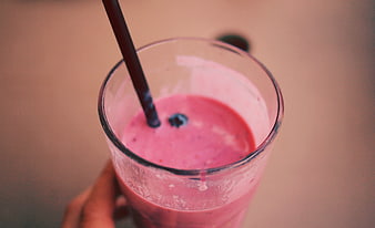 Pink Berry Smoothie in Glass with Black Straw