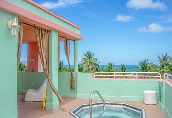 Tropical Rooftop Hot Tub With Ocean View And Palm Trees
