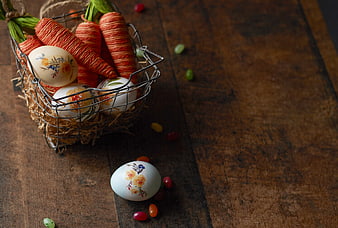 Rustic Easter Basket with Painted Eggs and Yarn Carrots