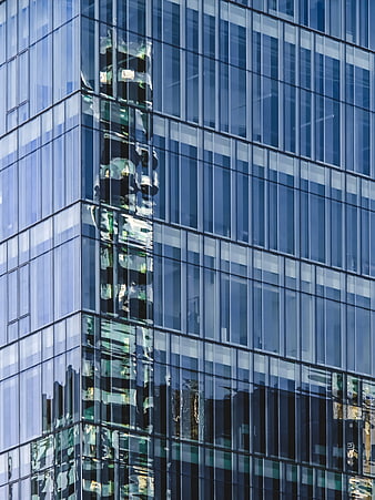 Modern Glass Skyscraper Facade with Reflections