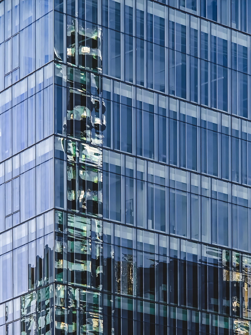 Modern Glass Skyscraper Facade with Reflections