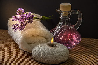 Spa Wellness Still Life With Lavender, Candle, And Oil Carafe