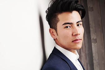 Portrait of Handsome Asian Businessman in Blue Suit