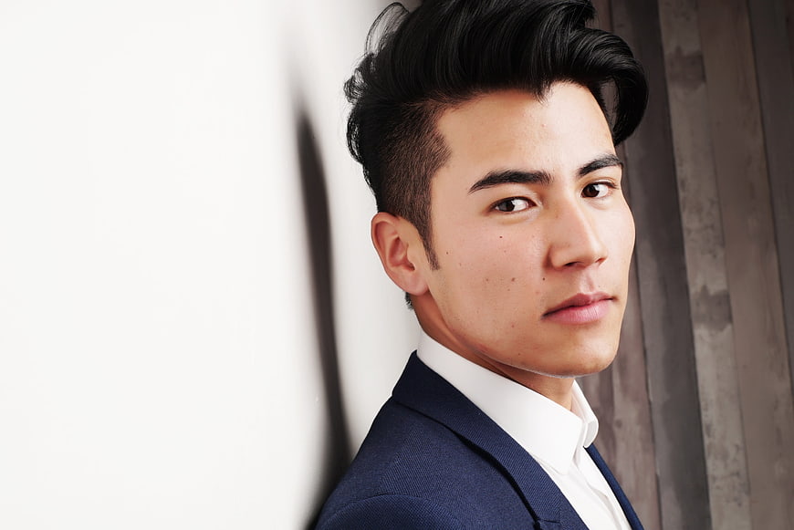 Portrait of Handsome Asian Businessman in Blue Suit