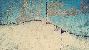 Textured Blue and Beige Cracked Concrete Wall Background