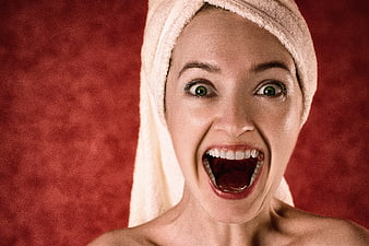 Excited Woman with Towel on Head Screaming in Joy