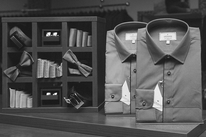Men's dress shirts and accessories in retail display