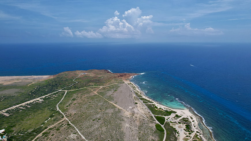 Aerial View of Coastal Peninsula with Turquoise Waters