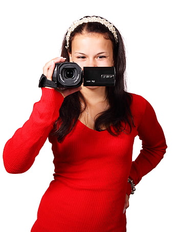 Woman in Red Dress Holding Black Video Camera