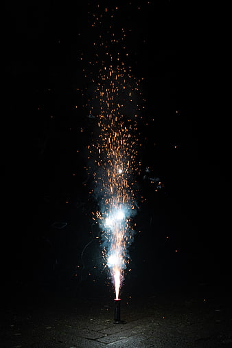 Vertical Firework Fountain Sparkling at Night