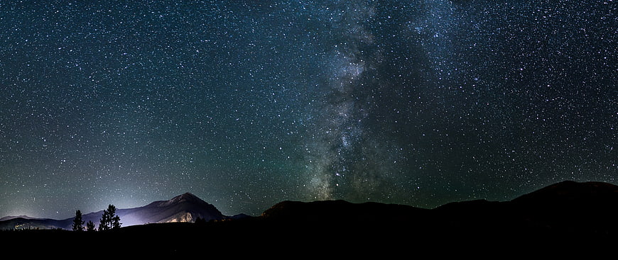 Milky Way Galaxy Over Mountain Silhouette Night Sky