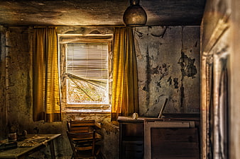 Abandoned Room with Broken Window and Peeling Walls