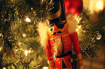 Close-up of Nutcracker Ornament on Christmas Tree