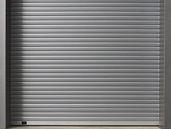 Closed Gray Metal Roller Shutter Door Texture Background