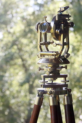 Vintage Brass Theodolite Surveying Instrument on Wooden Tripod