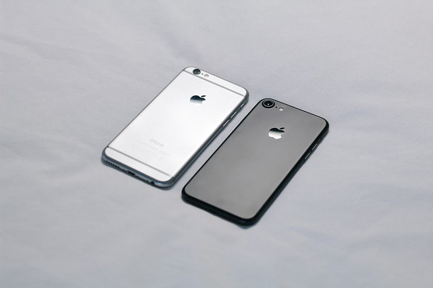 Silver and Space Gray iPhones on White Background