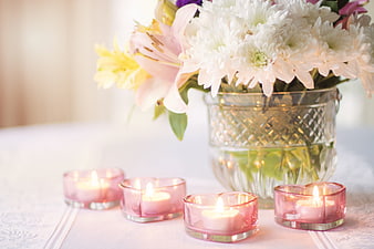 Romantic Pink Heart Candles and White Flowers in Glass Vase