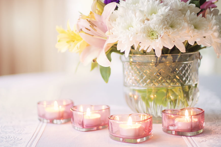 Romantic Pink Heart Candles and White Flowers in Glass Vase