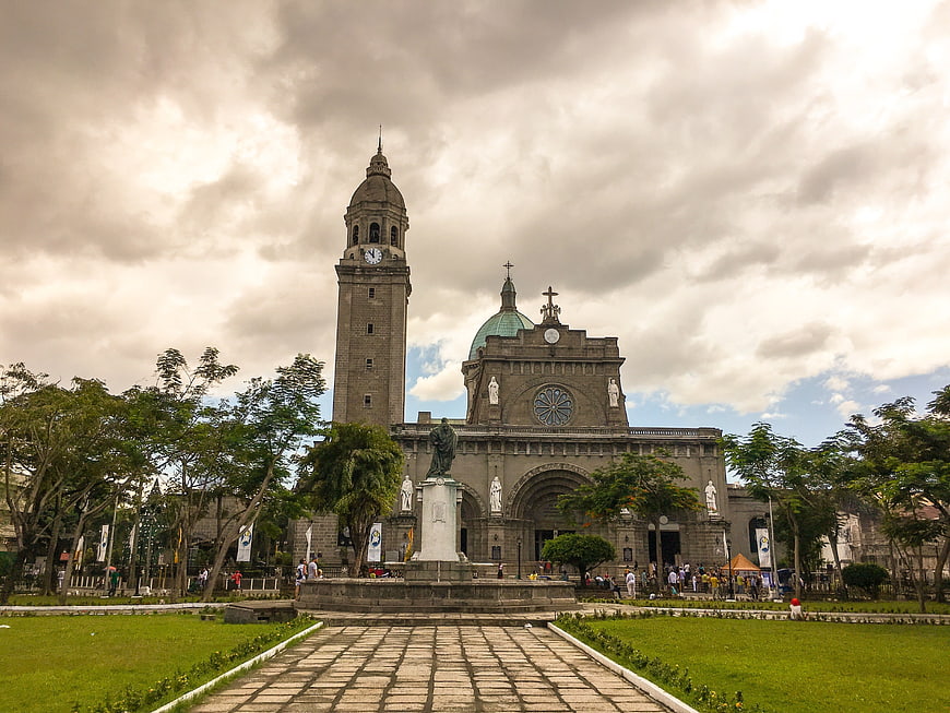 Manila Cathedral Plaza With Statue And Clock Tower