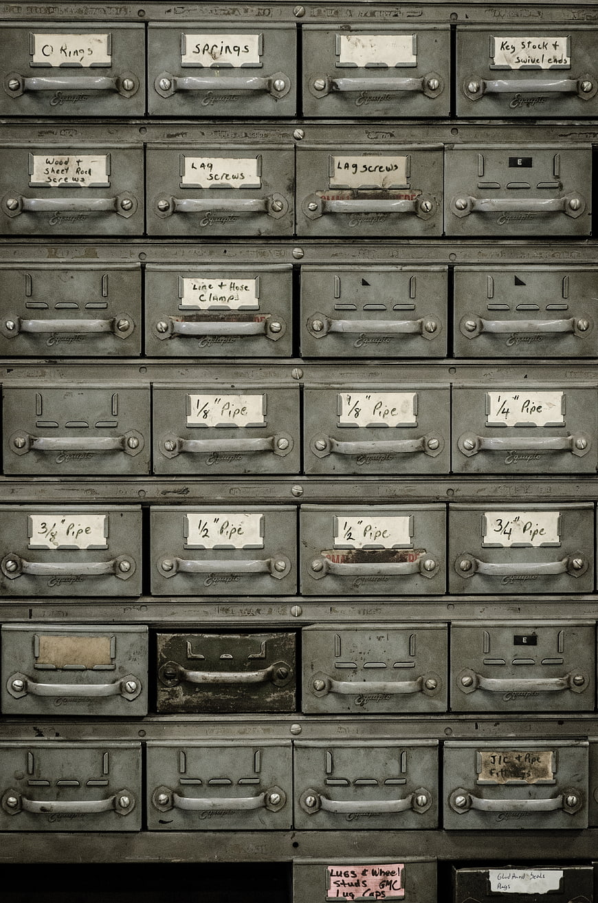 Vintage Metal Hardware Cabinet with Handwritten Labels