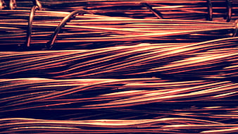Close-up of copper wire bundles with industrial texture