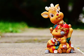 Cute Christmas Reindeer Figurine Holding Heart And Teddy Bear