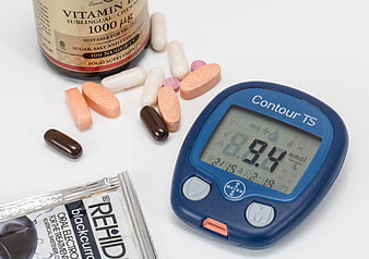 Diabetes management supplies with glucose meter and pills