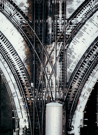 Aerial View of Snow-Covered Railway Tracks and Train