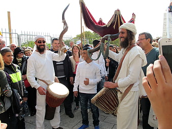 Jewish religious celebration with shofar and drum in Jerusalem