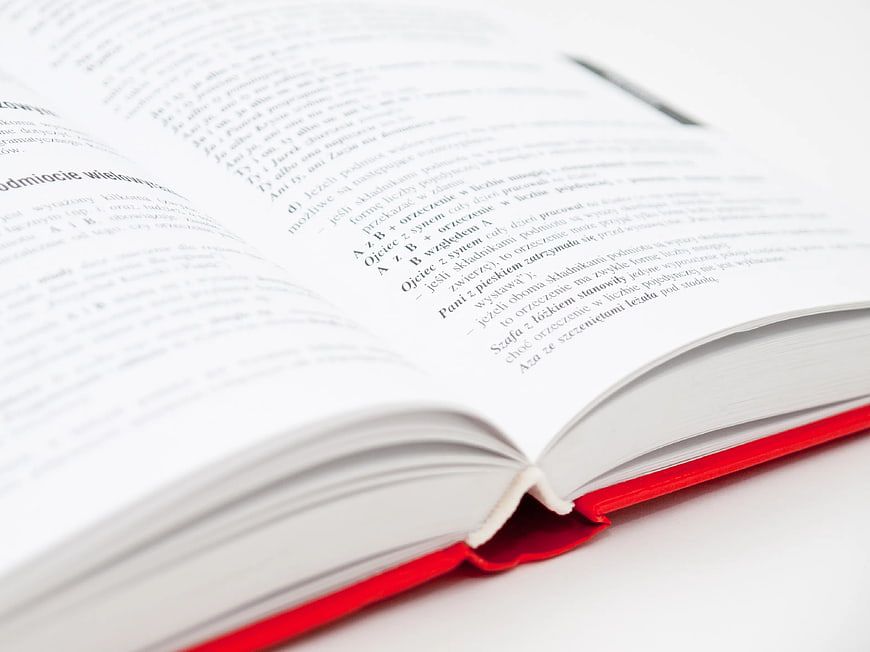 Close-up of Open Book with Red Bookmark