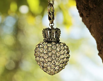Sparkling Rhinestone Heart Pendant Necklace Hanging from Tree