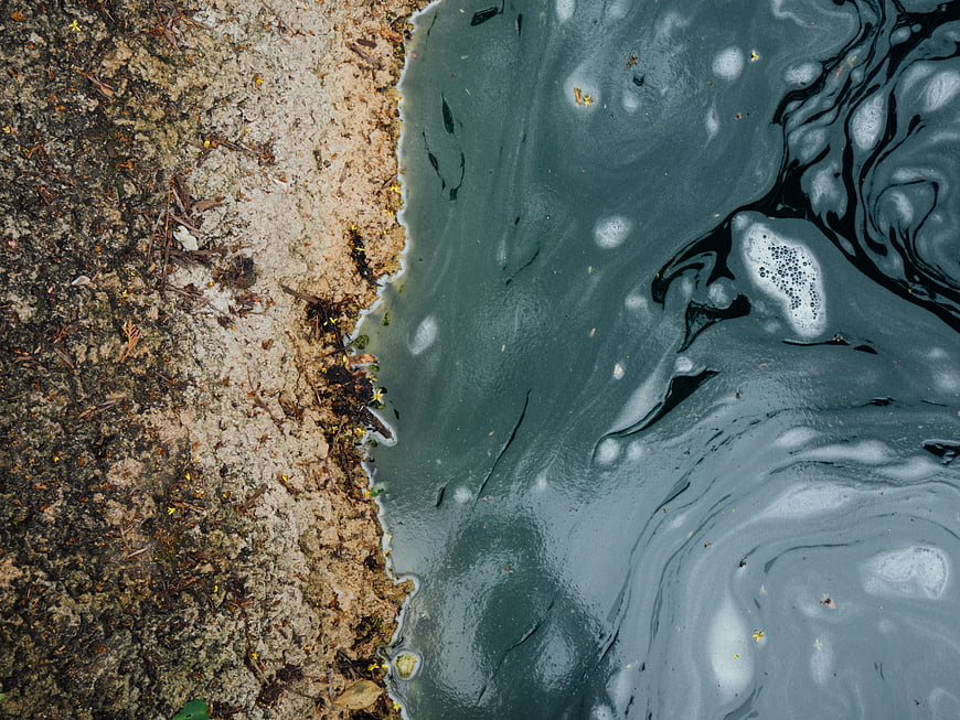 Abstract Top View of Turbulent Water Flowing Over Rough Stone