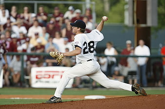 Baseball Pitcher Throwing Ball on Mound
