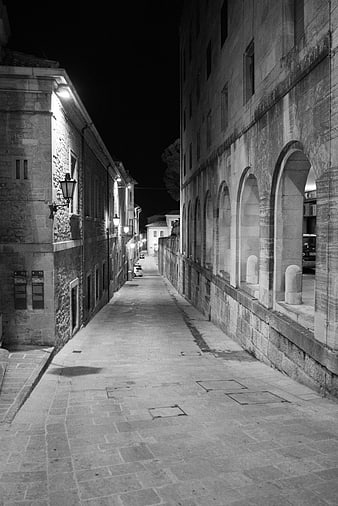 Black and white night street in San Marino, Italy