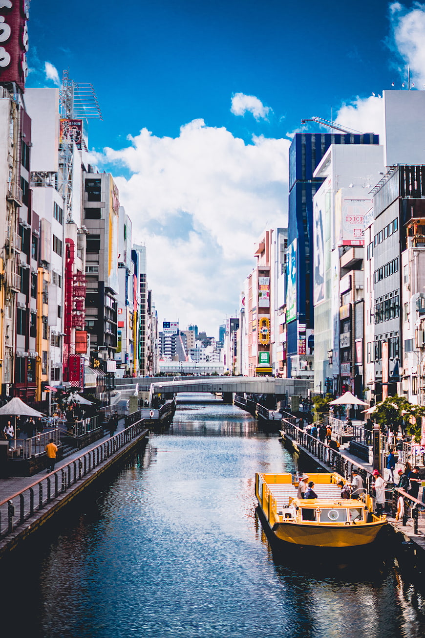 Yellow Boat on Urban Canal in Tokyo Japan