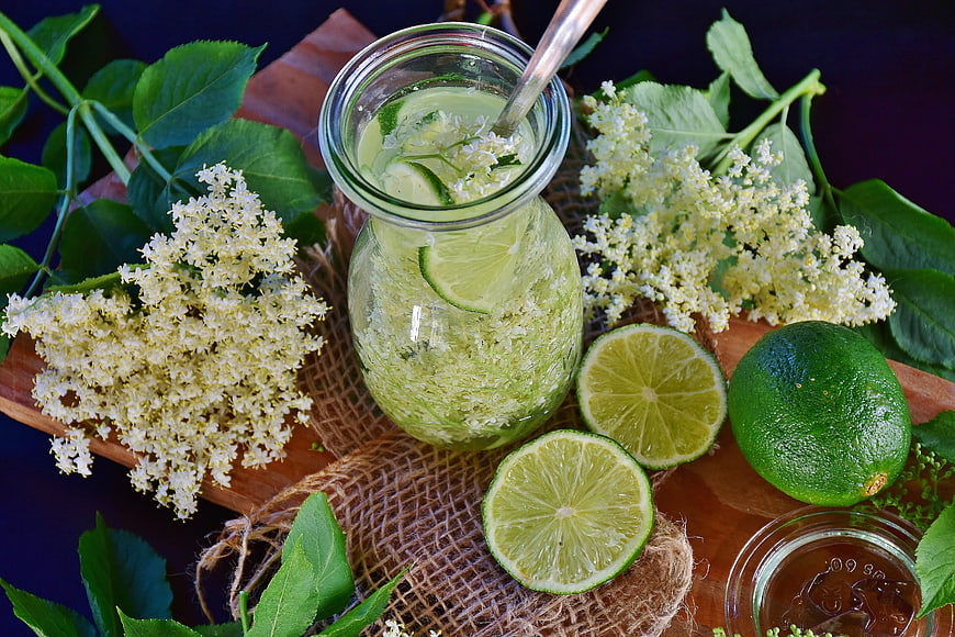 Fresh Elderflower and Lime Drink in Mason Jar